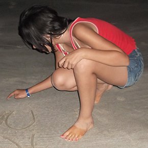 Person balancing on a log